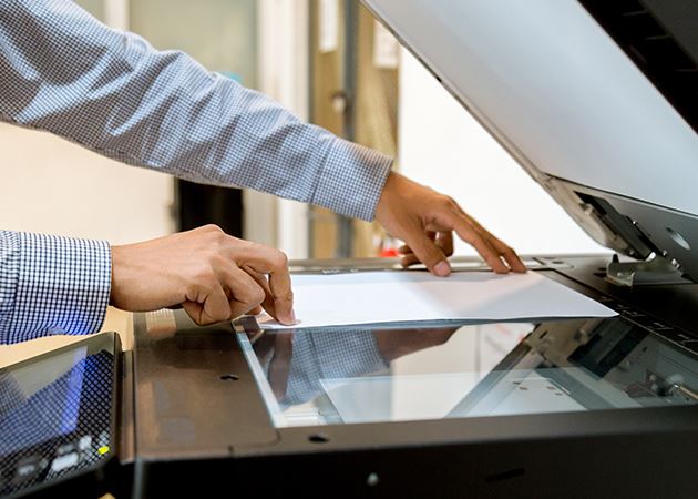 Person using a copier